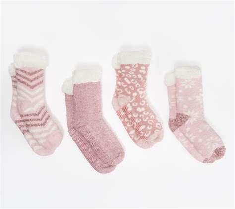 Crew socks hit mid calf; brushed interior for warmth; Machine washable- turn inside out, wash cold with like colors, gentle cycle, only non-chlorine bleach when needed, tumble dry low, do not iron;. . Cuddl duds socks